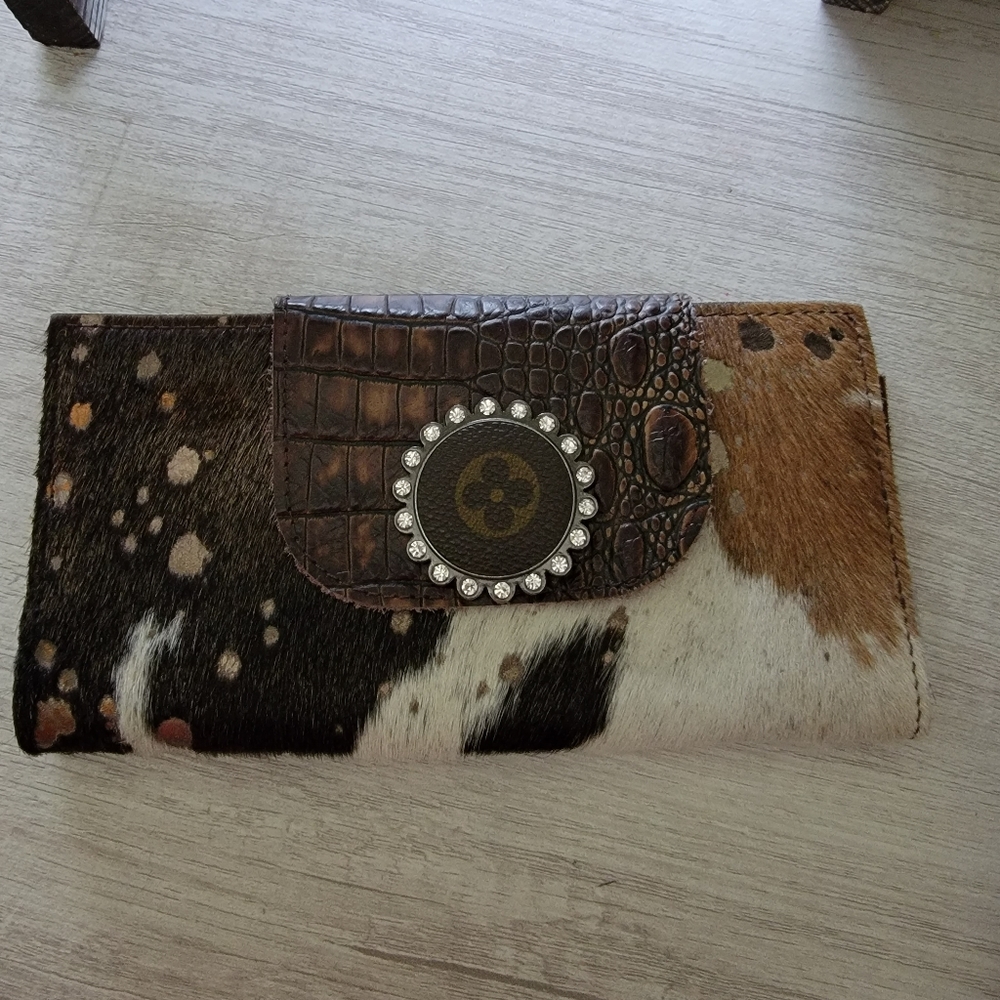 Hair on hide wallet with medallion snap